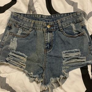 Ripped jean shorts